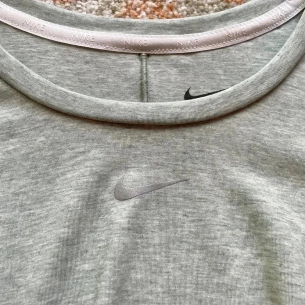 Nike Women's Dri-FIT One Luxe Twist Cropped Oversized Fit Short-Sleeve Top